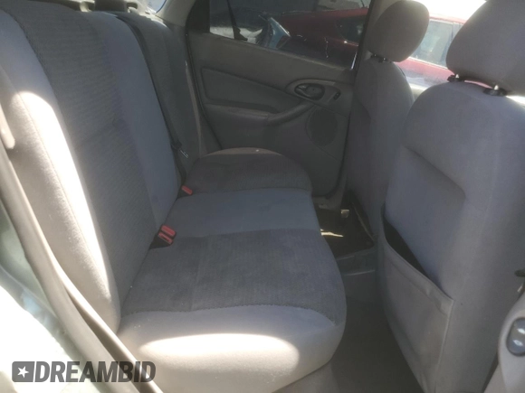 2004 Ford Focus SE with VIN 1FAFP36384W191801, listed as a Copart auction lot 63661465 with 144,226 mi miles and Salvage title. Bid and sale history available at DreamBid. Image 10.