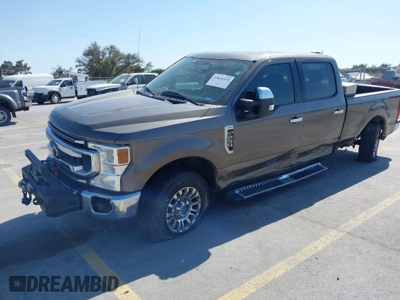 2020 Ford F-250 XL with VIN 1FT7W2B62LEE05827, listed as a IAAI auction lot 41816519 with 128,457 mi miles and . Bid and sale history available at DreamBid. Image 2.