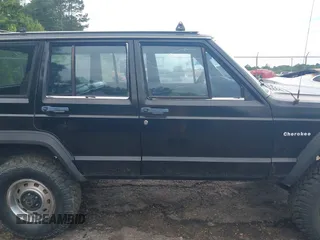 1987 Jeep Cherokee with VIN 1JCMR7819HT174249, listed as a IAAI auction lot 42458110 with 157,683 mi miles and . Bid and sale history available at DreamBid. Image 13.