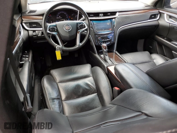 2015 Cadillac XTS Luxury with VIN 2G61M5S35F9225559, listed as a Copart auction lot 55638885 with 130,620 mi miles and Clean title. Bid and sale history available at DreamBid. Image 8.