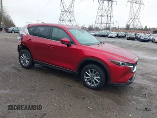 2023 Mazda CX-5 2.5 S Select Package with VIN JM3KFBBM8P0199092, listed as a IAAI auction lot 41851908 with 34,491 mi miles. Bid and sale history available at carsss.com. Image 1.
