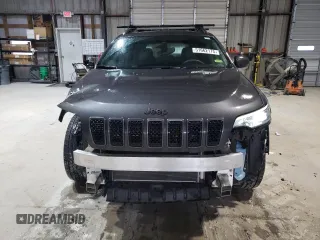 2021 Jeep Cherokee 80th Anniversary with VIN 1C4PJMMX7MD220289, listed as a Copart auction lot 51662175 with 77,109 mi miles and Salvage Title. Bid and sale history available at carsss.com. Image 5.