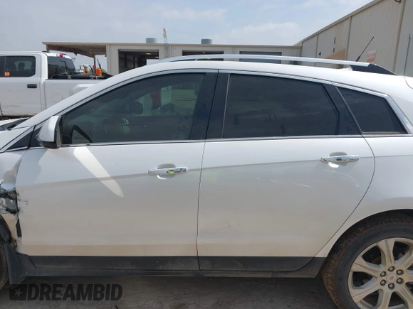 2013 Cadillac SRX Performance Collection с VIN 3GYFNDE30DS648288, выставлен на аукционе IAAI как лот 41955462 с пробегом 135 956 миль миль и . История ставок и продаж доступна на DreamBid. Изображение 14.