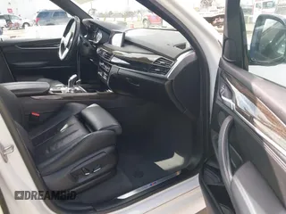 2016 BMW X5 xDrive35i with VIN 5UXKR0C56G0P32566, listed as a IAAI auction lot 41899474 with 79,563 mi miles. Bid and sale history available at carsss.com. Image 5.