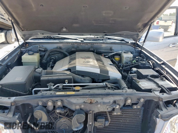2001 Lexus LX 470 z VIN JTJHT00W313504330, wystawiony jako Copart lot #61126435 z przebiegiem 87 049 mil mil oraz Czysty tytuł • Clean title. Historia ofert i sprzedaży dostępna na DreamBid. Obrazek 12.