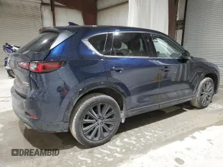 2022 Mazda CX-5 2.5 Turbo with VIN JM3KFBAY1N0636626, listed as a Copart auction lot 52257685 with 41,329 mi miles and Salvage Title. Bid and sale history available at carsss.com. Image 3.