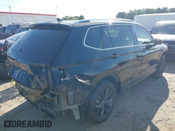 2024 Volkswagen Tiguan SE with VIN 3VVMB7AX9RM125851, listed as a IAAI auction lot 42265007 with 6,064 mi miles and . Bid and sale history available at DreamBid. Image 4.