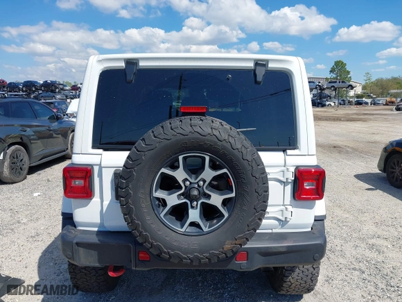 2021 Jeep Wrangler Unlimited Rubicon with VIN 1C4HJXFN9MW519496, listed as a IAAI auction lot 41676845 with 72,767 mi miles. Bid and sale history available at carsss.com. Image 16.