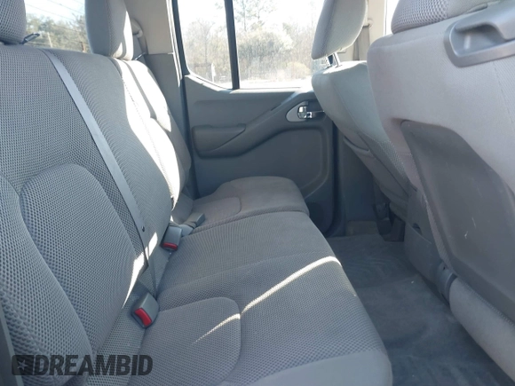 2013 Nissan Frontier SV with VIN 1N6AD0EV6DN720356, listed as a IAAI auction lot 41694570 with 243,279 mi miles and . Bid and sale history available at DreamBid. Image 8.