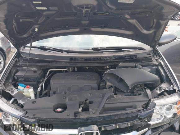2014 Honda Odyssey EX-L with VIN 5FNRL5H64EB026520, listed as a IAAI auction lot 42562290 with 118,890 mi miles and . Bid and sale history available at DreamBid. Image 10.