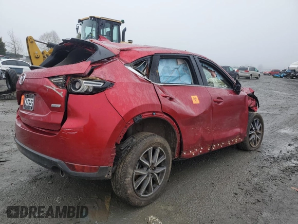 2018 Mazda CX-5 Grand Touring with VIN JM3KFBDM2J0432713, listed as a Copart auction lot 88693565 with 0 mi miles and Salvage Title. Bid and sale history available at carsss.com. Image 3.