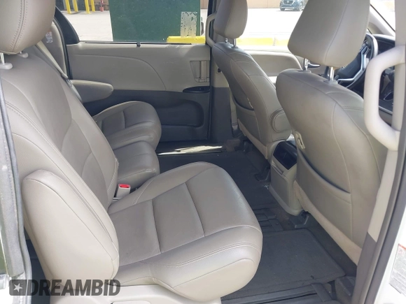 2015 Toyota Sienna LE AAS with VIN 5TDKK3DC4FS628853, listed as a IAAI auction lot 42188704 with 135,340 mi miles and . Bid and sale history available at DreamBid. Image 8.