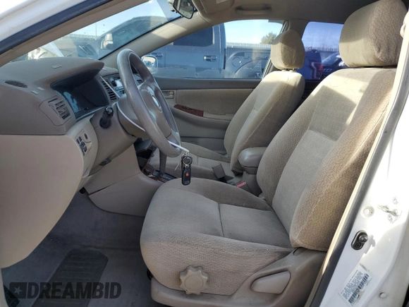 2003 Toyota Corolla CE with VIN 1NXBR32EX3Z057713, listed as a Copart auction lot 85710344 with 188,478 mi miles and Salvage Title. Bid and sale history available at DreamBid. Image 7.