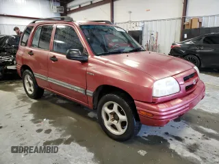 1999 Suzuki Vitara JLS z VIN 2S3TE52V6X6110719, wystawiony jako Copart lot #44219825 z przebiegiem 190 311 mil mil oraz Szkoda całkowita • Salvage title. Historia ofert i sprzedaży dostępna na DreamBid. Obrazek 4.