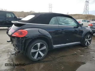 2013 Volkswagen Beetle with VIN 3VW7S7AT3DM819093, listed as a Copart auction lot 49997645 with 43,233 mi miles and Salvage Title. Bid and sale history available at DreamBid. Image 3.