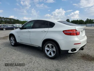 2014 BMW X6 xDrive35i z VIN 5UXFG2C53E0C42900, wystawiony jako Copart lot #55641745 z przebiegiem 156 045 mil mil oraz Tytuł czysty. Historia ofert i sprzedaży dostępna na DreamBid. Obrazek 2.