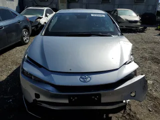 2024 Toyota Prius LE with VIN JTDACAAU4R3018502, listed as a Copart auction lot 56587885 with 22,266 mi miles and Salvage Title. Bid and sale history available at DreamBid. Image 5.