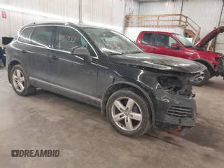 2012 Volkswagen Touareg Sport with VIN WVGEF9BP8CD009511, listed as a IAAI auction lot 41457989 with 87,325 mi miles and . Bid and sale history available at DreamBid. Image 1.