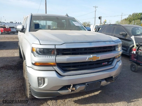 2017 Chevrolet Silverado 1500 LT with VIN 3GCUKREC2HG392487, listed as a IAAI auction lot 41807394 with 113,041 mi miles. Bid and sale history available at carsss.com. Image 1.