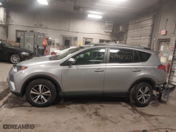 2017 Toyota RAV4 XLE with VIN 2T3RFREV3HW555319, listed as a IAAI auction lot 41946308 with 134,073 mi miles. Bid and sale history available at carsss.com. Image 14.
