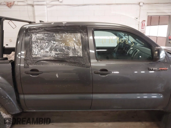 2014 Toyota Tacoma with VIN 3TMLU4EN3EM151917, listed as a IAAI auction lot 41769083 with 216,910 mi miles. Bid and sale history available at carsss.com. Image 13.