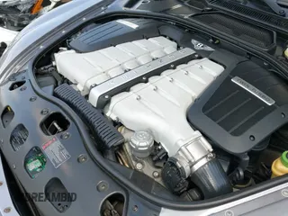 2006 Bentley Continental GT GT z VIN SCBCR63W96C038150, wystawiony jako IAAI lot #42769871 z przebiegiem 45 398 mil mil oraz . Historia ofert i sprzedaży dostępna na DreamBid. Obrazek 19.