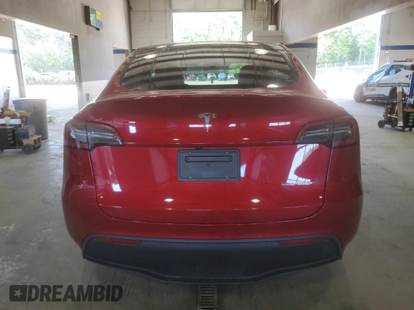 2024 Tesla Model Y Long Range with VIN 7SAYGDEE6RF995069, listed as a Copart auction lot 57085405 with 22,302 mi miles and Salvage title. Bid and sale history available at DreamBid. Image 6.