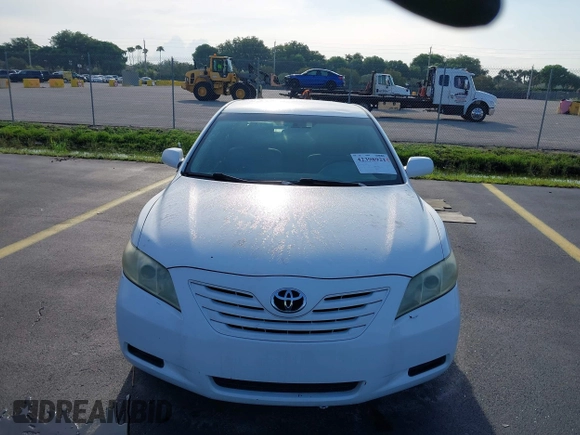2007 Toyota Camry CE z VIN 4T1BE46K27U670867, wystawiony jako IAAI lot #42398921 z przebiegiem 142 655 mil mil oraz . Historia ofert i sprzedaży dostępna na DreamBid. Obrazek 12.