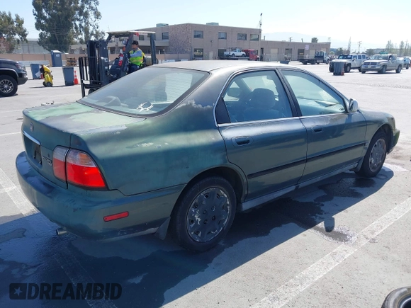 1997 Honda Accord LX with VIN 1HGCD5637VA212185, listed as a IAAI auction lot 42093376 with 239,668 mi miles and . Bid and sale history available at carsss.com. Image 4.