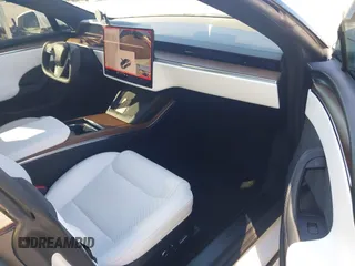 2021 Tesla Model S Long Range with VIN 5YJSA1E56MF453711, listed as a IAAI auction lot 41467603 with 115,634 mi miles and . Bid and sale history available at DreamBid. Image 5.