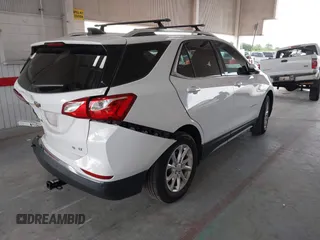 2018 Chevrolet Equinox LT z VIN 3GNAXJEV2JL285919, wystawiony jako IAAI lot #42417524 z przebiegiem 79 402 mil mil oraz . Historia ofert i sprzedaży dostępna na DreamBid. Obrazek 4.