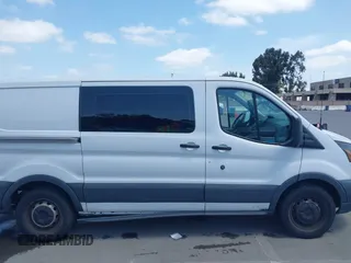 2016 Ford Transit Cargo with VIN 1FTYE1YM6GKB51876, listed as a IAAI auction lot 42009817 with 139,446 mi miles. Bid and sale history available at carsss.com. Image 13.