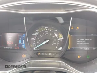 2016 Ford Fusion Titanium Hybrid with VIN 3FA6P0RU3GR190355, listed as a IAAI auction lot 42384309 with 157,172 mi miles and . Bid and sale history available at DreamBid. Image 7.