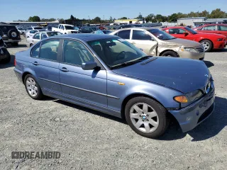 2003 BMW 3 Series 325i with VIN WBAET37453NJ37219, listed as a Copart auction lot 69101914 with 100,816 mi miles and Salvage Title. Bid and sale history available at carsss.com. Image 4.