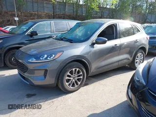 2021 Ford Escape SE z VIN 1FMCU9G66MUA11210, wystawiony jako IAAI lot #42205135 z przebiegiem 35 165 mil mil oraz . Historia ofert i sprzedaży dostępna na DreamBid. Obrazek 2.
