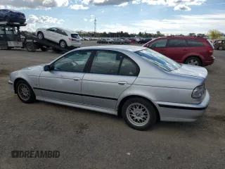 2000 BMW 5 Series 528iA with VIN WBADM6346YGU10549, listed as a Copart auction lot 75047164 with 324,945 mi miles and Salvage Title. Bid and sale history available at carsss.com. Image 2.