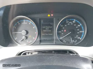 2018 Toyota RAV4 LE with VIN 2T3ZFREV2JW464807, listed as a IAAI auction lot 40966277 with 113,053 mi miles. Bid and sale history available at carsss.com. Image 7.