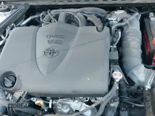 2022 Toyota Camry TRD z VIN 4T1KZ1AK4NU068897, wystawiony jako IAAI lot #41851894 z przebiegiem 45 160 mil mil oraz . Historia ofert i sprzedaży dostępna na DreamBid. Obrazek 21.