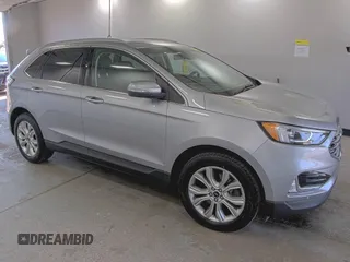 2020 Ford Edge Titanium z VIN 2FMPK4K91LBA91290, wystawiony jako IAAI lot #42494043 z przebiegiem 71 254 mil mil oraz . Historia ofert i sprzedaży dostępna na DreamBid. Obrazek 22.