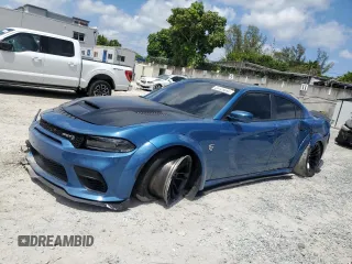 2022 Dodge Charger SRT Hellcat Widebody z VIN 2C3CDXL9XNH163976, wystawiony jako Copart lot #55128695 z przebiegiem 25 175 mil mil oraz Nie do naprawy • Non repairable. Historia ofert i sprzedaży dostępna na DreamBid. Obrazek 1.