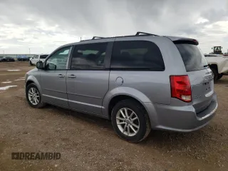 2014 Dodge Grand Caravan SXT with VIN 2C4RDGCG1ER304965, listed as a Copart auction lot 55478015 with 218,093 mi miles and Clean Title. Bid and sale history available at DreamBid. Image 2.