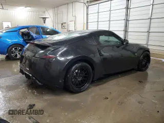 2009 Nissan 370Z z VIN JN1AZ44EX9M407193, wystawiony jako Copart lot #84891734 z przebiegiem 129 296 mil mil oraz Szkoda całkowita • Salvage title. Historia ofert i sprzedaży dostępna na DreamBid. Obrazek 3.