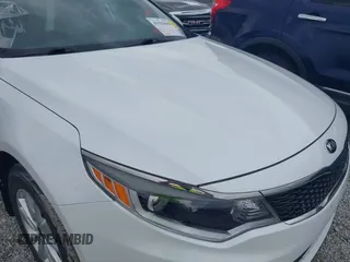2016 Kia Optima LX with VIN 5XXGT4L38GG048180, listed as a IAAI auction lot 41923650 with 58,018 mi miles. Bid and sale history available at carsss.com. Image 17.