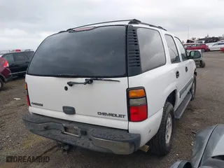 2004 Chevrolet Tahoe LT with VIN 1GNEK13T84J111012, listed as a IAAI auction lot 41662650 with 197,740 mi miles. Bid and sale history available at carsss.com. Image 4.