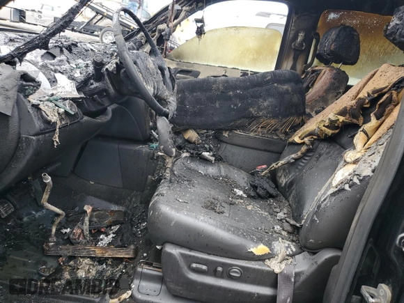 2013 Chevrolet Suburban LT with VIN 1GNSKJE72DR153552, listed as a Copart auction lot 50602315 with Not Provided miles and Salvage Title. Bid and sale history available at DreamBid. Image 7.