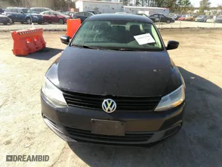 2014 Volkswagen Jetta Sedan S with VIN 3VW2K7AJ5EM310715, listed as a IAAI auction lot 41843290 with 257,801 mi miles. Bid and sale history available at carsss.com. Image 6.