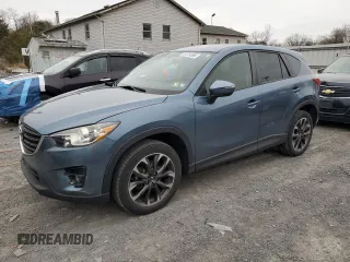 2016 Mazda CX-5 Grand Touring with VIN JM3KE4DY7G0761594, listed as a Copart auction lot 51514595 with 58,250 mi miles and Salvage Title. Bid and sale history available at DreamBid. Image 1.