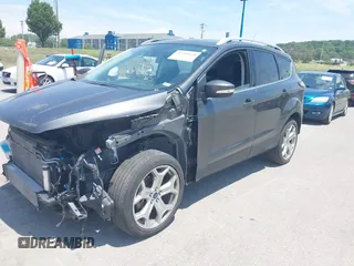2018 Ford Escape Titanium with VIN 1FMCU9J99JUD43804, listed as a IAAI auction lot 41101250 with 56,438 mi miles and . Bid and sale history available at DreamBid. Image 2.