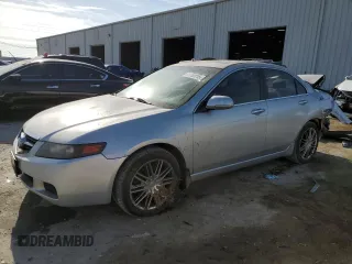 2004 Acura TSX w/Navigation with VIN JH4CL96914C041044, listed as a Copart auction lot 51760115 with 280,975 mi miles and Salvage title. Bid and sale history available at DreamBid. Image 1.