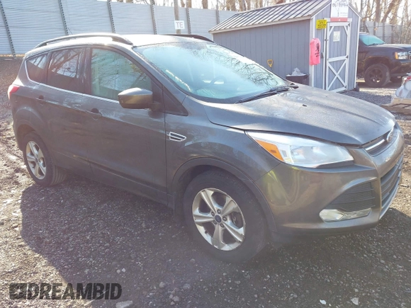 2015 Ford Escape SE with VIN 1FMCU9GX6FUB35649, listed as a IAAI auction lot 42055398 with 128,524 mi miles. Bid and sale history available at carsss.com. Image 1.